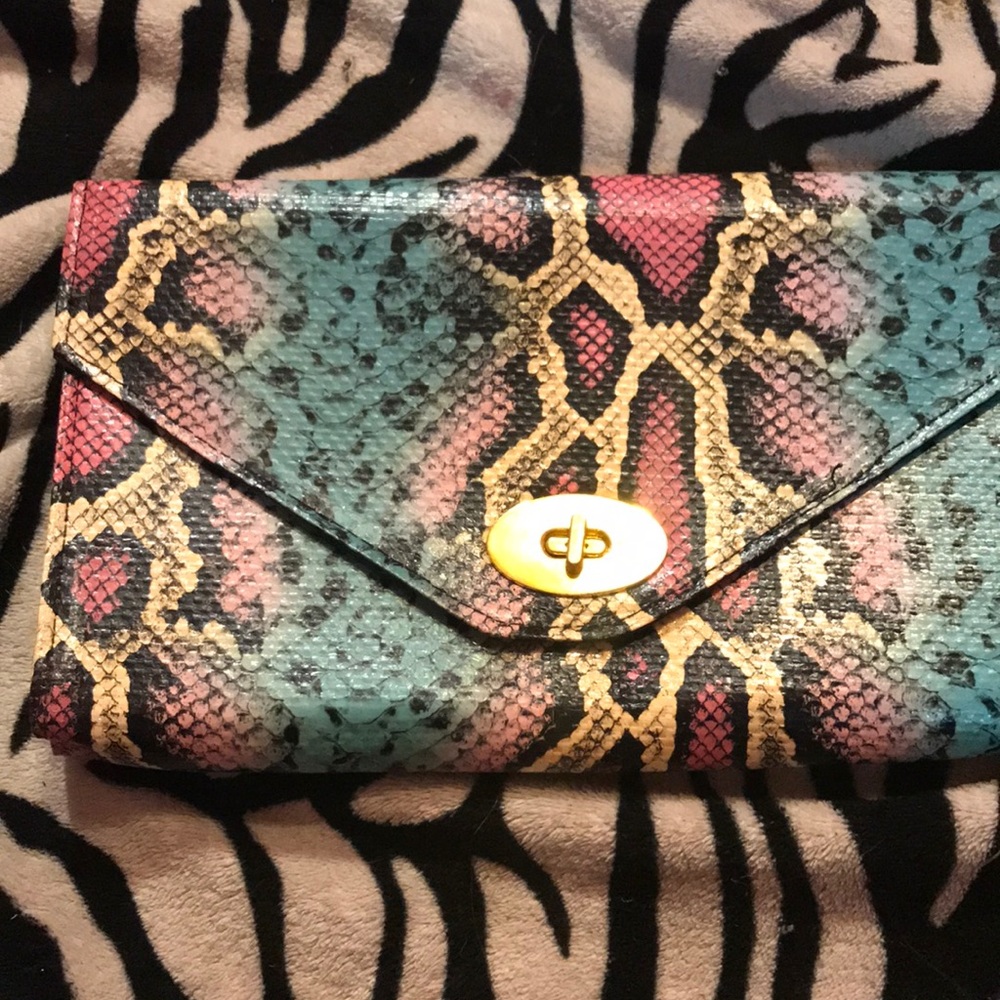 NEVER USED faux snakeskin multicolored clutch
